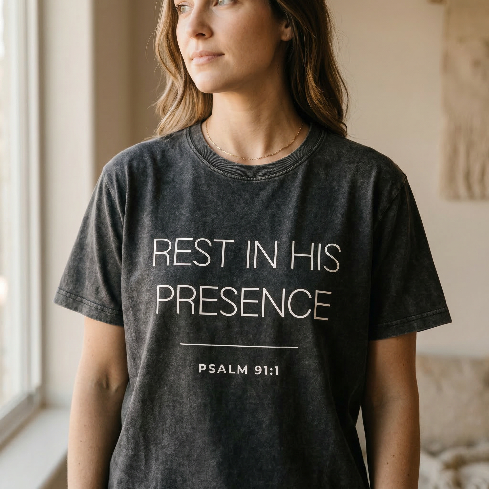 Close up of the "rest in his presence psalm 91:1" cotton t shirt showing soft fabric texture and clean printed text.
