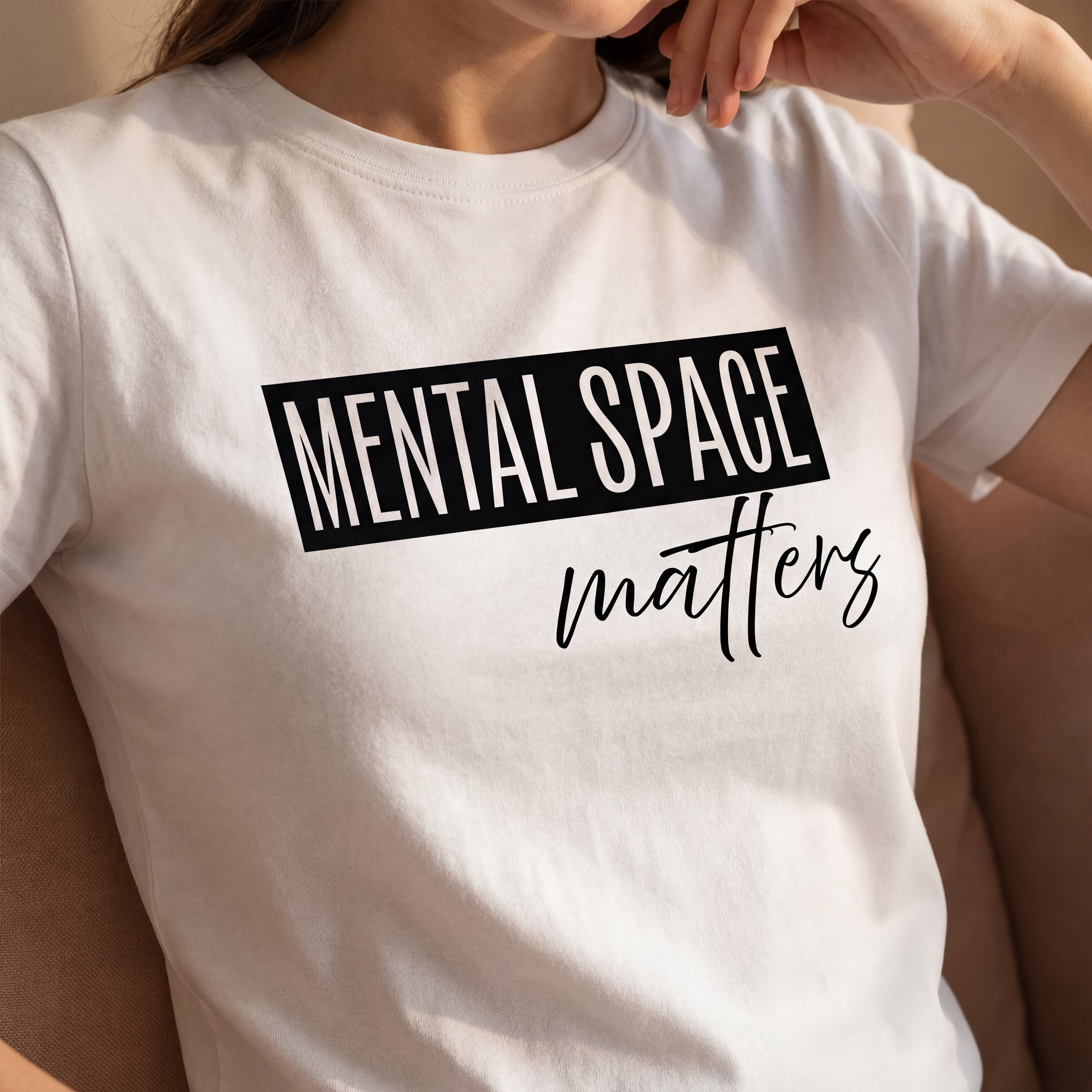 Close up of the "mental space matters" organic cotton t shirt showing soft fabric texture and clean printed text.
